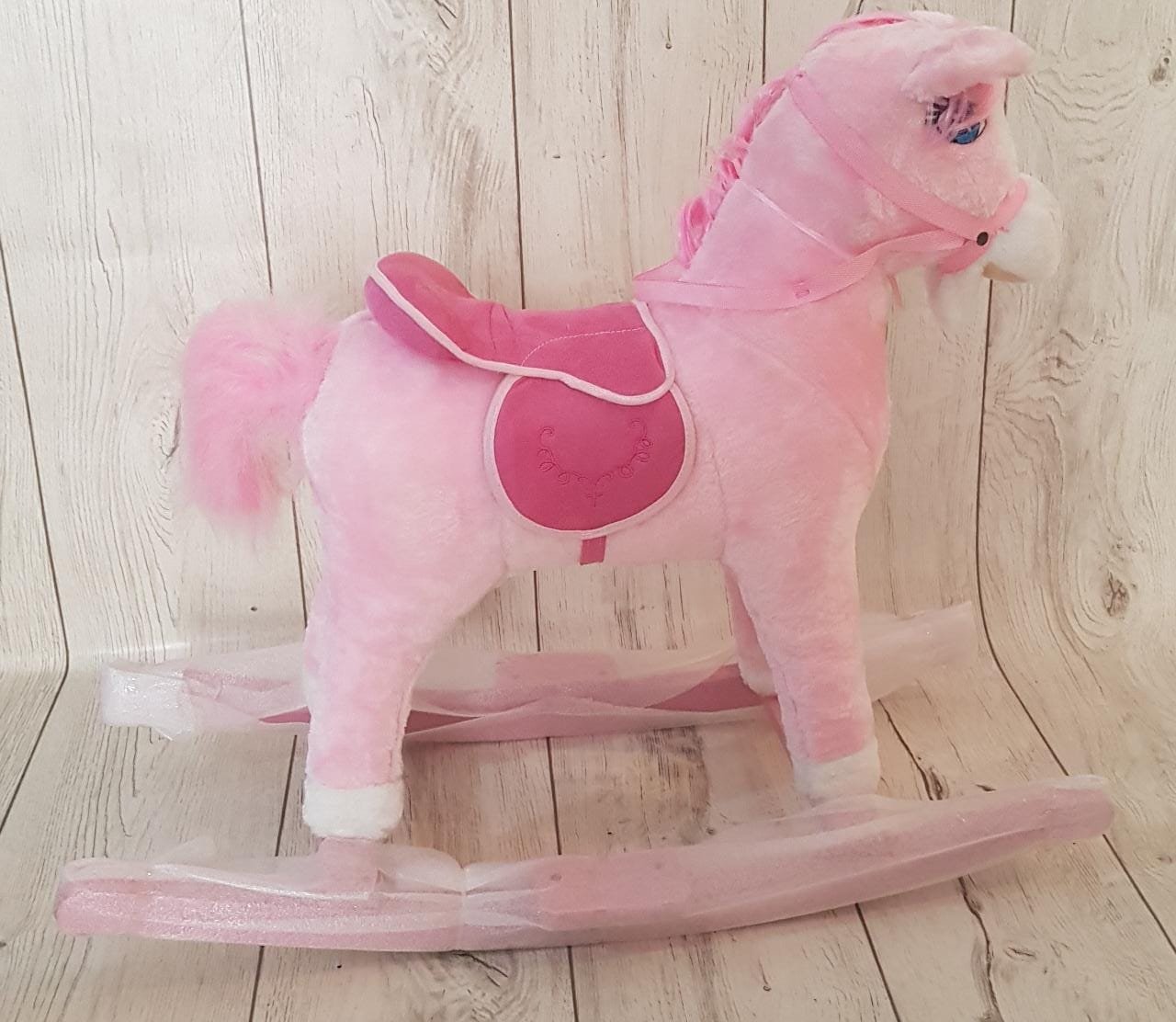 Cheval à bascule rose pour fille 